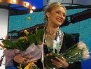 Кристина Орбакайте с букетом от "AMF - международная сеть доставки цветов"
